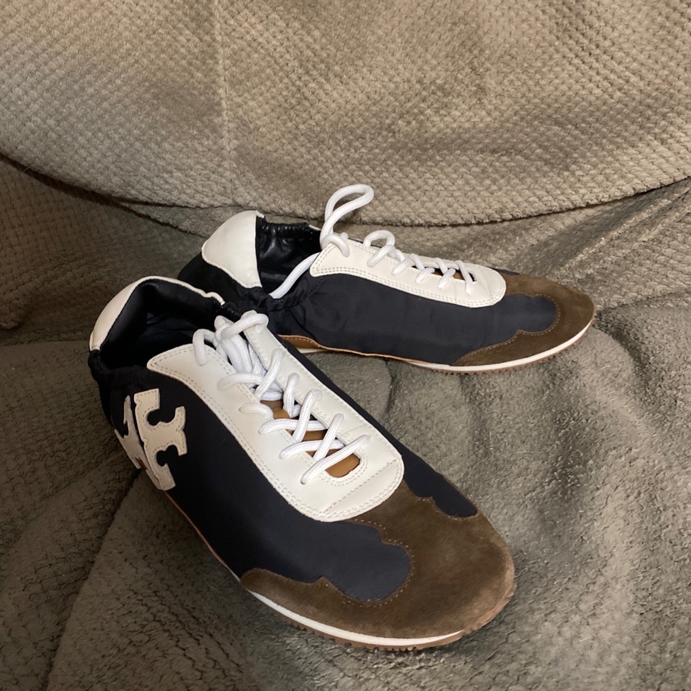 New, never worn Tory Burch “trainer” sneakers. Navy with brown logo. Size 10.5.